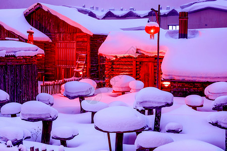 下雪夜景温暖的雪乡背景