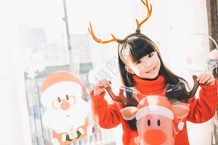 雪人圣诞节装扮圣诞节日装扮的小女孩背景