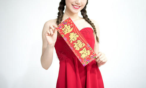 拿着中国结的新年女性背景图片