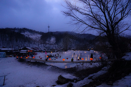 雪乡春节冬季东北雪谷雪乡灯笼雪景亲子游背景