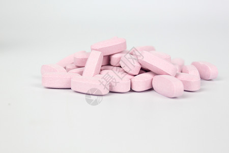 粉色药片粉色小药片背景