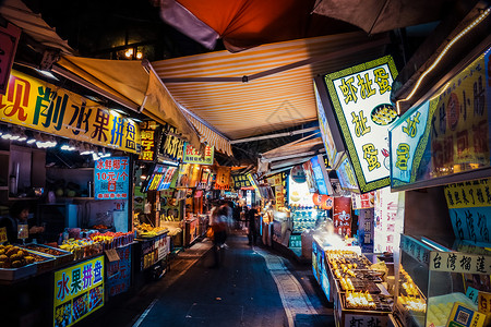 旅行特价游曾厝垵夜晚街景背景