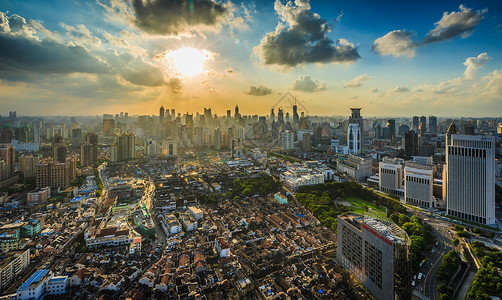 日落余晖下的上海城市风光建筑背景高清图片素材