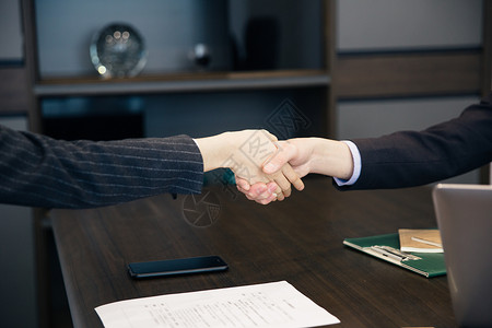商务人士合作握手企业高清图片素材