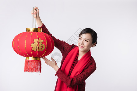 新春汉服美女手拿灯笼祝贺高清图片