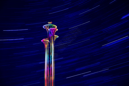 彩色流星雨光效天空星轨北京奥林匹克塔背景