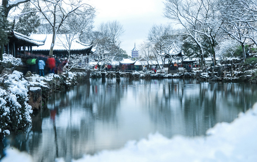 拙政园雪景图片