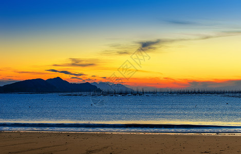 海边的晨曦背景图片