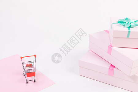 粉色礼物盒购物车高清图片素材