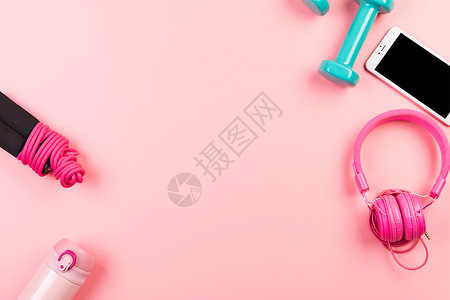 健身耳机素材女性粉色健身静物背景背景