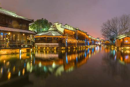 西栅夜景浙江乌镇雪后夜景背景