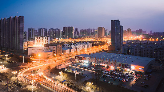 新疆库尔勒城市夜景大厦高清图片素材