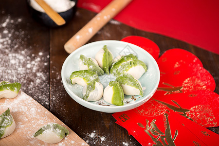 过年红色背景的饺子食物高清图片素材