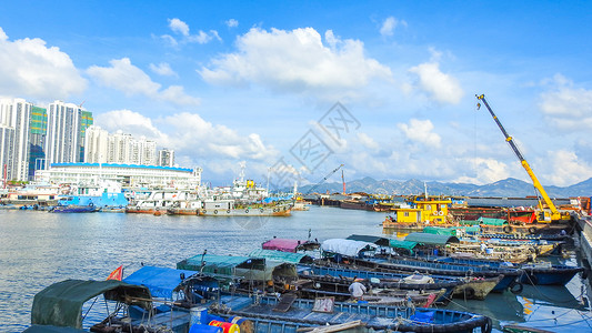 船舶桅杆蓝天白云下的港口码头船只背景