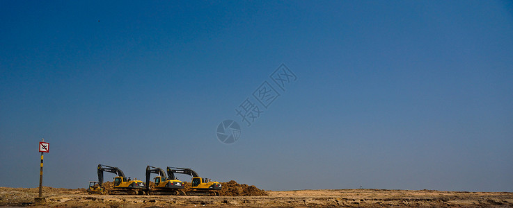 柬埔寨挖掘机施工现场背景图片