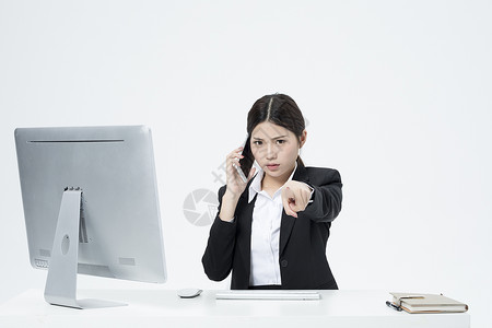 电话生气交谈的职业女性商业高清图片素材