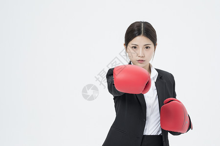 戴着拳击手套的职业女性图片