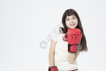 戴着拳击手套的女学生图片