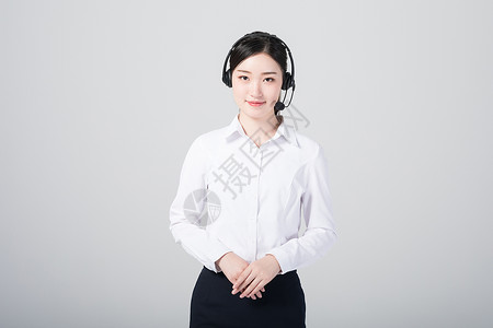 头戴耳机的女性客服形象背景图片