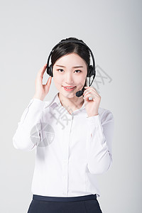 头戴耳机的女性客服形象图片头戴耳机的女性客服形象背景