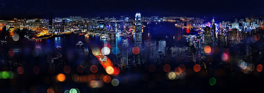 夜幕下的港口城市背景图片