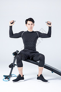 运动男性仰卧板握力器高清图片