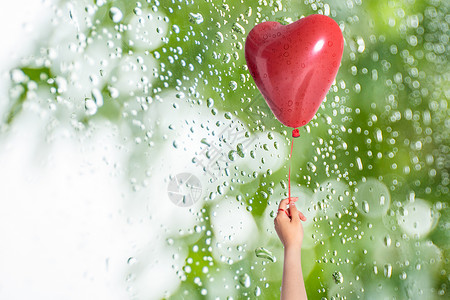 雨中的女孩雨中的气球设计图片