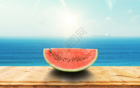 海边桌面水果图片