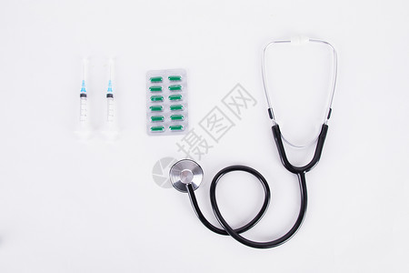 医疗听诊器和药片背景图片