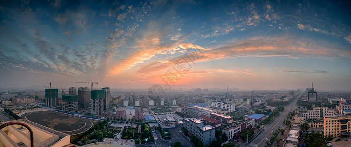 宽阔整洁的街道城市晚霞背景