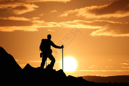 登山日出站在山顶的人物剪影设计图片