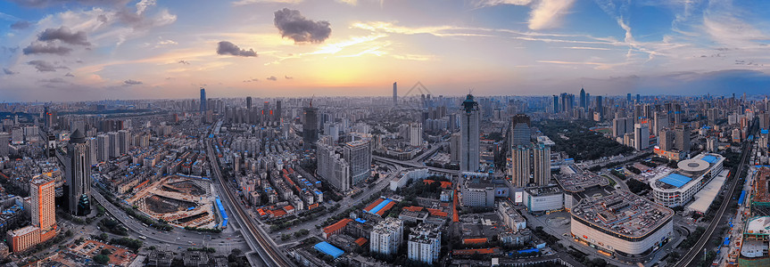 夕阳下的城市全景街拍图片素材