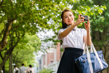 校园写真女生拍照女孩高清图片素材