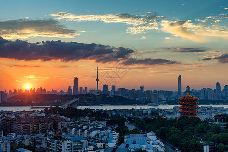 日落时分的长江主轴黄鹤楼长江大桥景观高楼高清图片素材