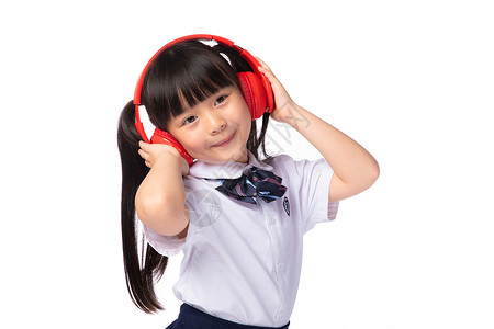 可爱的小女生戴耳机听音乐的小女生背景