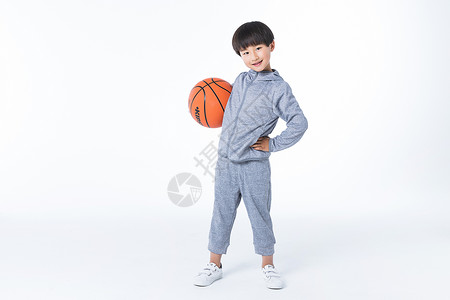 少儿体育体育男孩玩篮球背景