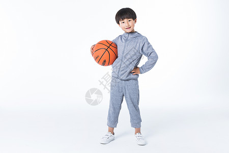 少儿体育体育男孩玩篮球背景