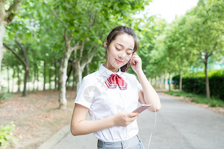 音乐学校素材学校里听歌的女同学背景