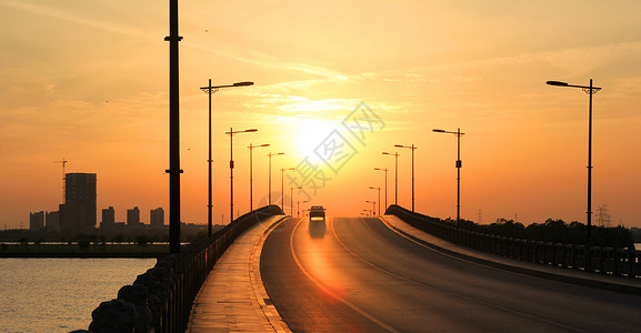 路燈夕阳下的公路背景