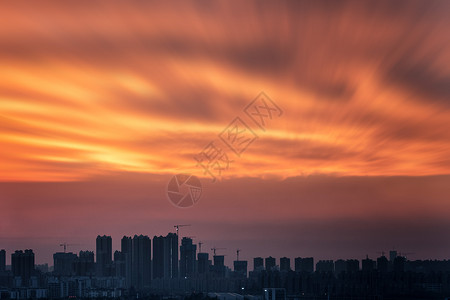 城市上空的火烧云摄影高清图片素材