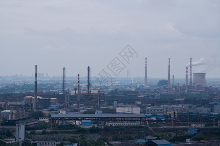 污染之源武汉钢铁工厂厂房烟囱背景