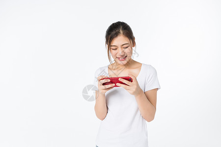 青年女孩玩手机图片