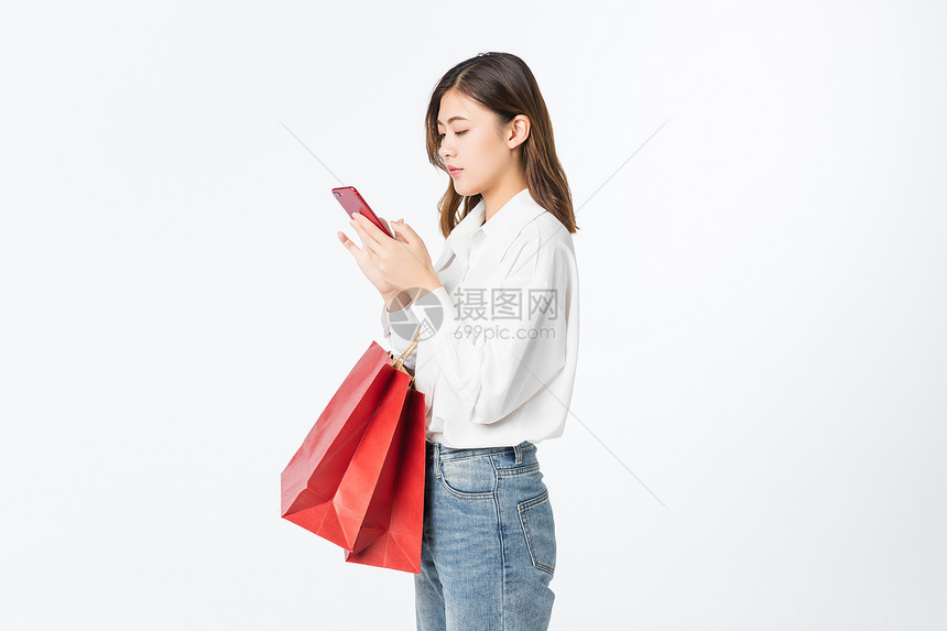 618女性开心购物用手机图片