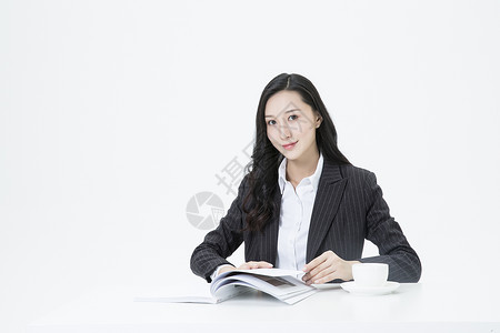 商务女性休闲看书高清图片