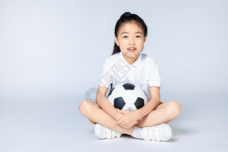 踢足球小女孩儿童足球运动背景