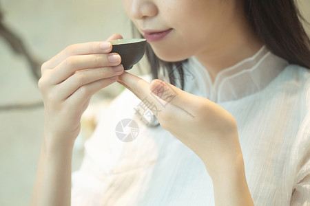 茶艺服品茶的美女背景