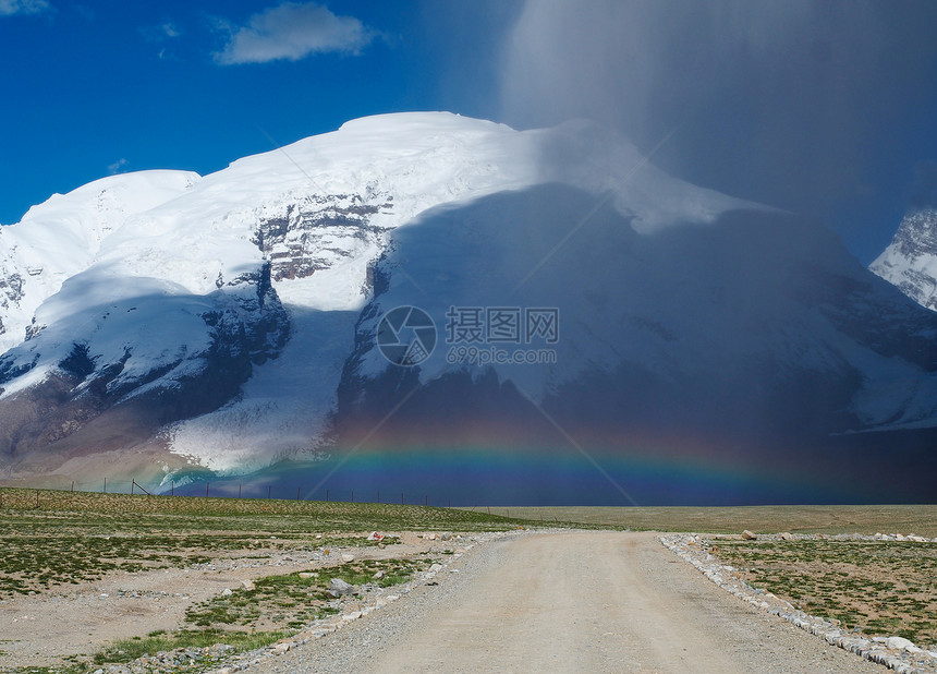 慕士塔格峰彩虹下雨雪山图片