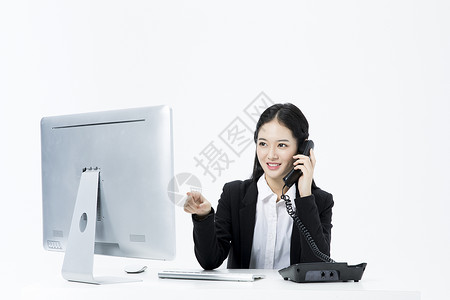 商务女性工作电话交谈图片