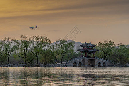 萨满文化日落的春满颐和园背景