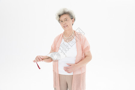 老年奶奶扇扇子图片